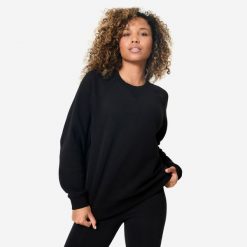 Bluza damska Domyos Gym & Pilates. Czarne bluzy DOMYOS, xl, bez wzorów, z materiału, bez kaptura. Za 69.99 zł.