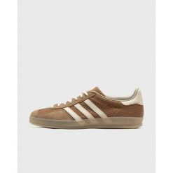Uniseksowe buty sportowe ADIDAS GAZELLE INDOOR. Brązowe trekkingi Adidas, z gumy, trekkingowe. Za 731.30 zł.