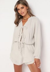 Beżowy Wiązany Bawełniany Kombinezon Boho z Falbankami i Wiązaniem Lalelia. Brązowe sukienki Born2be, na co dzień, na lato, uniwersalny, bez wzorów, z bawełny, boho, bez kołnierzyka, bez ramiączek, proste. Za 169.99 zł.