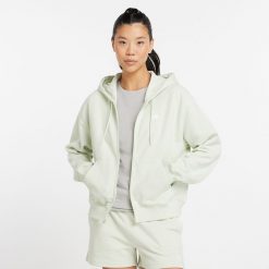 Bluza damska New Balance WJ41501NUM – miętowa. Zielone bluzy New Balance, l, bez wzorów, z bawełny, z kapturem. Za 169.99 zł.