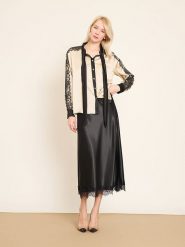 BGN Bluzka w kolorze kremowo-czarnym rozmiar: 38. Brązowe bluzki BGN, bez wzorów, z koronki, bez kołnierzyka, bez ramiączek. Za 143.99 zł.