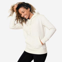 Bluza z kapturem damska Domyos Gym & Pilates. Białe bluzy DOMYOS, m, bez wzorów, z bawełny, z kapturem. W wyprzedaży za 79.99 zł.