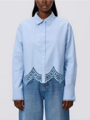 Koszula z ażurowym dołem - jasnoniebieski. Niebieskie koszule Reserved, l, w ażurowe wzory, z bawełny, bez kołnierzyka, bez ramiączek. Za 149.99 zł.