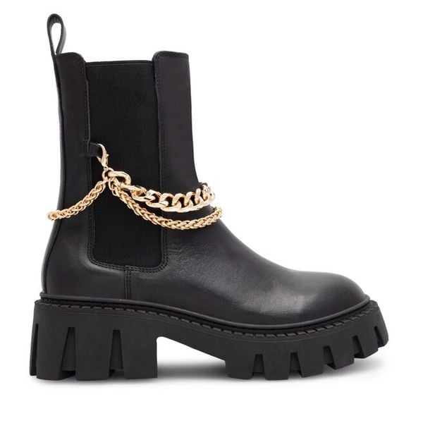 Botki Eva Minge. Czarne botki Eva Minge, bez wzorów, bez obcasa, na słupku, bez zapięcia. Za 419.99 zł.