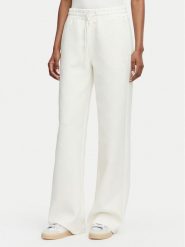Guess Spodnie dresowe V6YB10 K4295 Kremowy Regular Fit. Białe spodnie dresowe Guess, xs, z aplikacjami, z dresówki. Za 344.99 zł.