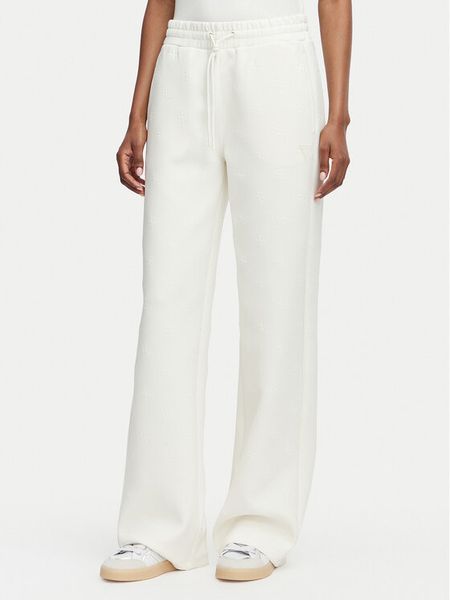 Guess Spodnie dresowe V6YB10 K4295 Kremowy Regular Fit. Białe spodnie dresowe Guess, xl, z aplikacjami, z dresówki. Za 250.99 zł.