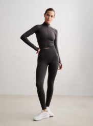 Damskie legginsy dłuższe, wysoki stan, invisible scrunch Shape Seamless szare. Szare legginsy AIM'N, s, bez wzorów, z dzianiny, z podwyższonym stanem, długie. Za 300.00 zł.