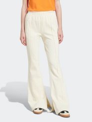 Adidas Spodnie dresowe w kolorze kremowym rozmiar: XL. Brązowe spodnie dresowe Adidas, xl, bez wzorów, z dresówki. Za 223.99 zł.