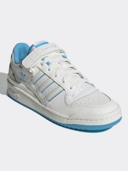 Adidas Skórzane buty sportowe w kolorze biało-błękitnym rozmiar: 39. Białe obuwie sportowe Adidas, bez zapięcia. Za 383.03 zł.