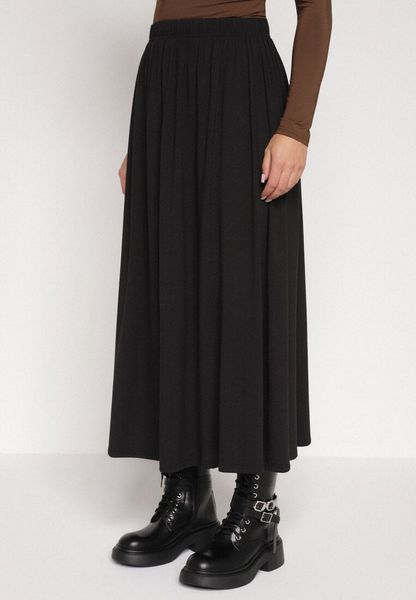 Czarna Bawełniana Spódnica o Rozkloszowanym Kroju Tusnara. Czarne spódnice Born2be, l, bez wzorów, z bawełny, midi, oversize. Za 109.99 zł.