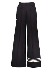 Adidas Spodnie dresowe w kolorze czarnym rozmiar: 40. Czarne spodnie dresowe Adidas, bez wzorów, z dresówki. Za 140.53 zł.