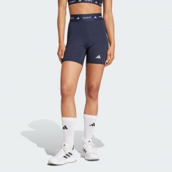 Legginsy TECHFIT Short. Niebieskie legginsy Adidas, bez wzorów, z materiału, krótkie. Za 129.00 zł.