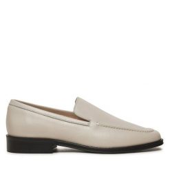 Lordsy Calvin Klein. Brązowe lordsy Calvin Klein, bez wzorów, bez obcasa, bez zapięcia. Za 349.99 zł.