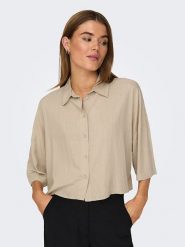 ONLY Koszulka w kolorze beżowym rozmiar: XL. Brązowe bluzki Only, xl, bez wzorów, bez kołnierzyka, bez ramiączek. Za 57.20 zł.