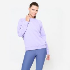 Bluza damska Domyos Gym & Pilates. Fioletowe bluzy DOMYOS, l, bez wzorów, z materiału, bez kaptura. W wyprzedaży za 49.99 zł.