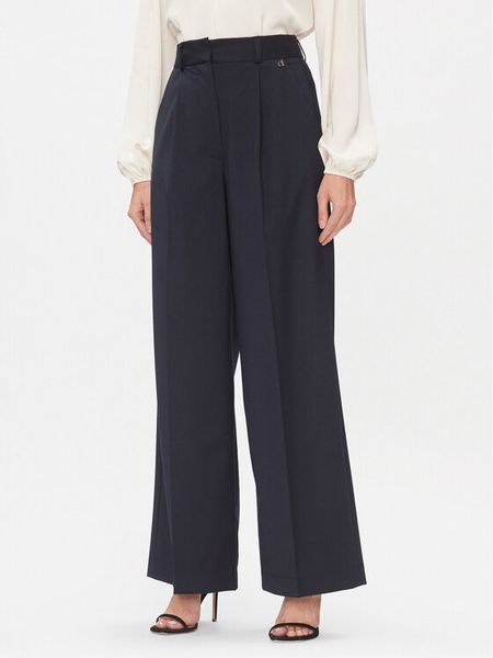 Dixie Spodnie materiałowe PCHSVCGA Granatowy Relaxed Fit. Niebieskie spodnie materiałowe Dixie, m, bez wzorów, z materiału. Za 679.99 zł.