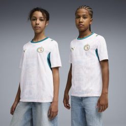 Młodzieżowa koszulka domowa Senegal 2026 PUMA. Biała bluzki Puma, l, bez wzorów, młodzieżowe, bez kołnierzyka, bez ramiączek. Za 339.00 zł.