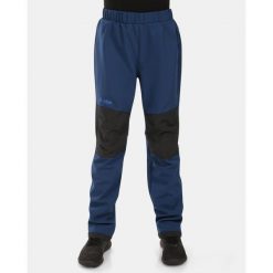 Pantaloni outdoor softshell per bambini Kilpi RIZO-J. Niebieskie spodnie sportowe Kilpi, na lato, bez wzorów, z softshellu, outdoorowe. Za 179.35 zł.