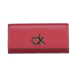 Portfel w kolorze czerwonym. Czerwone portfele Calvin Klein, bez wzorów, z materiału. W wyprzedaży za 289.95 zł.
