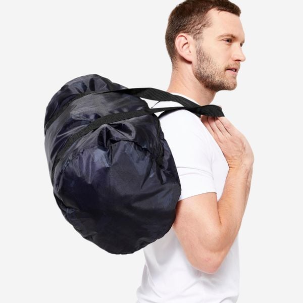 Torba jamnik Move 100 30 L składana. Niebieskie torby na ramię DECATHLON, bez wzorów, z materiału, sportowe, na ramię, małe, bez dodatków. Za 24.99 zł.