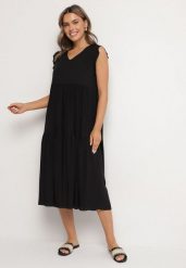 Czarna Bawełniana Sukienka Ozdobiona Falbankami Aveliova. Czarne sukienki Born2be, na co dzień, l, bez wzorów, z bawełny, eleganckie, bez kołnierzyka, bez ramiączek, midi, proste. Za 39.99 zł.