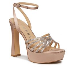Sandały Guess. Brązowe sandały Guess, z aplikacjami, bez obcasa, na słupku, bez zapięcia. Za 849.99 zł.