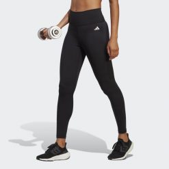 Legginsy treningowe z wysoką talią damskie 7/8 adidas Essentials. Czarne legginsy Adidas, xs, bez wzorów, z materiału. Za 199.00 zł.