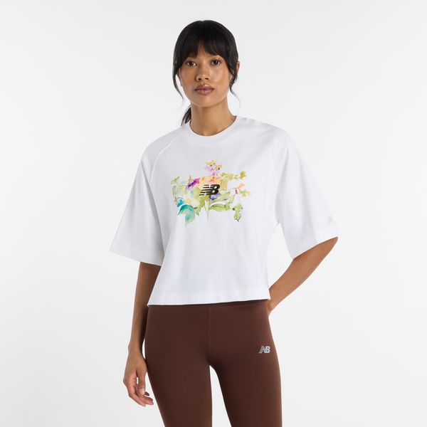 Koszulka damska New Balance WT61371RWT – biała. Białe bluzki New Balance, m, z aplikacjami, z materiału, bez kołnierzyka, bez ramiączek. Za 169.99 zł.