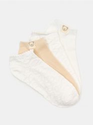 Bawełniane stopki 4 pack - kremowy. Białe skarpety Sinsay, bez wzorów, z bawełny. Za 12.99 zł.