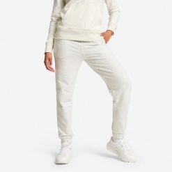 Spodnie dresowe damskie. Szare spodnie dresowe DOMYOS, s, bez wzorów, z bawełny, na jogę i pilates. Za 99.99 zł.