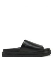 Calvin Klein Jeans Klapki Flat Molded Sandal Slide YW0YW01710 Czarny. Czarne klapki Calvin Klein Jeans, bez wzorów, z jeansu, bez obcasa. Za 219.99 zł.