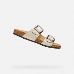 Sandały damskie Geox Brionia R I. Brązowe sandały Geox, bez wzorów, z gumy, biznesowe, bez obcasa, bez zapięcia. Za 381.00 zł.