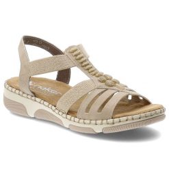 Sandały damskie Rieker, cholewka ze skóry naturalnej i materiału tekstylnego paski dla lepszego dopasowania, beżowe, 66201-62. Brązowe sandały Rieker, bez wzorów, ze skóry, bez obcasa, na koturnie, bez zapięcia. Za 319.00 zł.