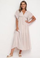 Beżowa Taliowana Sukienka z Bawełny Ozdobiona Falbanami przy Rękawach i Gumką w Talii Rivasie. Brązowe sukienki Born2be, na imprezę, na lato, m, bez wzorów, z bawełny, bez kołnierzyka, bez ramiączek, maxi. Za 139.99 zł.