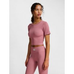 Damska koszulka bezszwowa Hummel Pulse. Fioletowe bluzki Hummel, bez wzorów, sportowe, bez kołnierzyka, bez ramiączek. Za 153.50 zł.
