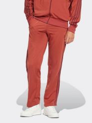 Adidas Spodnie dresowe w kolorze czerwonym rozmiar: XXL. Czerwone spodnie dresowe Adidas, xxl, bez wzorów, z dresówki. Za 169.67 zł.