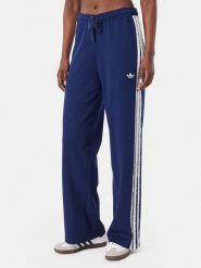 Adidas Spodnie dresowe Firebird KW2605 Niebieski Regular Fit. Niebieskie spodnie dresowe Adidas, m, bez wzorów, z dresówki. Za 314.99 zł.