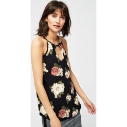 Top z aplikacją. Czarne topy MOODO, xs, z aplikacjami, bez kołnierzyka, bez ramiączek. Za 9.99 zł.