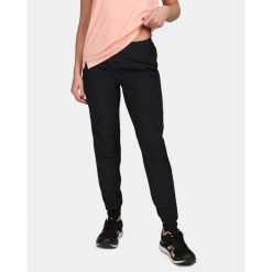 Damskie spodnie do biegania Kilpi HEYES-W. Czarne spodnie dresowe Kilpi, l, bez wzorów, z dresówki, do biegania. Za 253.99 zł.