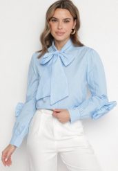 Niebieska Koszula z Ozdobnym Wiązaniem i Falbankami Zalimira. Niebieskie koszule Born2be, bez wzorów, z jeansu, eleganckie, bez kołnierzyka, bez ramiączek. Za 119.99 zł.