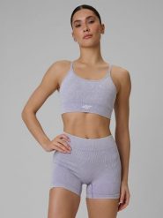 4F Biustonosz treningowy bezszwowy z niskim wsparciem damski - różowy M/L. Fioletowe bielizna sportowa 4f, l, bez wzorów. Za 119.99 zł.