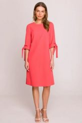 Klasyczna elegancka sukienka trapezowa koral. Pomarańczowe sukienki Stylove, do pracy, l, bez wzorów, z materiału, biznesowe, bez kołnierzyka, bez ramiączek, proste. Za 299.00 zł.