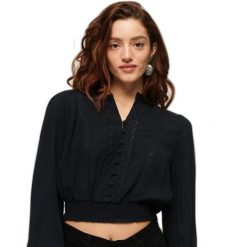 Damska bluzka z długim rękawem i koronkowym wykończeniem Superdry. Niebieskie bielizna sportowa Superdry, l, bez wzorów, z koronki. Za 284.00 zł.