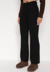 Czarne Prążkowane Spodnie z Wełną o Szerokim Kroju z Wysokim Stanem Reinnia. Czarne spodnie materiałowe Born2be, na co dzień, s, bez wzorów, z jeansu, z podwyższonym stanem. Za 79.99 zł.