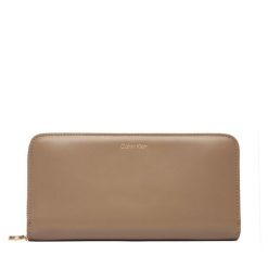 Portfel Calvin Klein. Brązowe portfele Calvin Klein, bez wzorów. Za 329.99 zł.