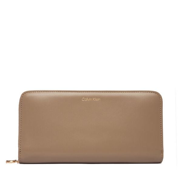 Portfel Calvin Klein. Brązowe portfele Calvin Klein, bez wzorów. Za 329.99 zł.