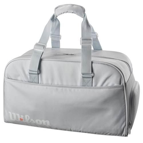 Torba sportowa unisex Wilson WR8030201. Niebieskie torby na ramię Wilson, bez wzorów, z materiału, eleganckie, na ramię, duże, bez dodatków. Za 225.00 zł.