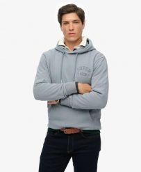 Superdry Bluza z kapturem Athletic Essentials Luźny krój – Flint Stone Blue Grey. Niebieskie bluzy Superdry, uniwersalny, bez wzorów, z bawełny, z kapturem. Za 311.50 zł.