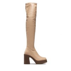 Kozaki DeeZee. Brązowe kozaki DeeZee, bez obcasa, na słupku, bez zapięcia. Za 229.99 zł.