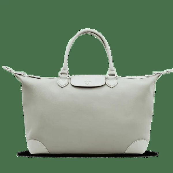 Torba podróżna WINGS WILLOW elegancka pojemna LIGHT BLUE. Niebieskie torby na ramię Wings, bez wzorów, z materiału, eleganckie, na ramię, bez dodatków. Za 189.90 zł.